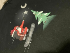 Camiseta oversize con santa en internet