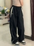 Pantalón deportivo holgado