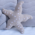 Almofada Formato Estrela do Mar em Plush Náutico - Biah Decorações