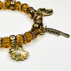 PULSEIRA DE CRISTAIS COM PINGENTES - OXUM | ÂMBAR - loja online