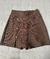 Short saia risca giz pérolas