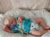 Bebê Reborn Realista com Cabelinho Fio a Fio e Acessórios – 48cm - comprar online