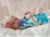 Bebê Reborn Realista com Cabelinho Fio a Fio e Acessórios – 48cm - loja online