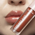 Gloss Labial Radiant Kiss Ruby Rose na internet