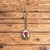 Colar dourado com medalha relicário bordada com rosas pink - comprar online