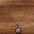 Colar charmoso com relicário em metal ouro com bordado com flores rosa vermelhas e borboleta na internet