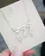 Necklace wears hearts with 3 children