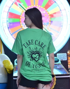 REMERA TAKE CARE - OVER