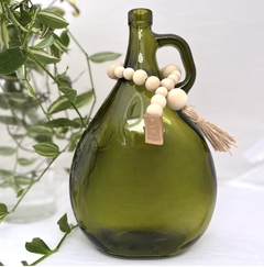 Florero verde de vidrio