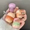 labial en forma de honguito