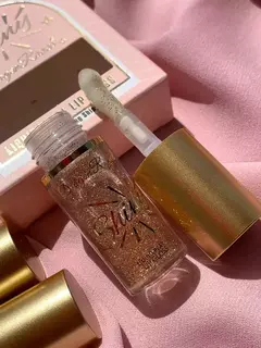 lip gloss con aplicador grande y brillitos