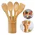 Kit de utensílios em bambu com cinco peças, incluindo colher, espátula e garfo, armazenados em um suporte de bambu.