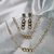 Conjunto Três elos Colar, Pulseira, Brinco com Zircônia