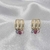 Brinco Vazado com Zircônia Rosa - comprar online