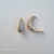 Brinco Meia Argola Gota com Zircônias - M - comprar online