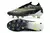 Chuteiras Nike Phantom GX de corte preta e branca na internet