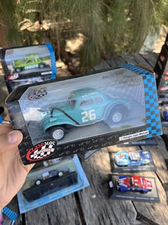 Autito en Caja, Juan Manuel Fangio