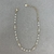 PULSEIRA MINI PÉROLAS E PONTO DE LUZ - comprar online
