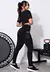Imagem do Conjunto Fitness Cropped Preto + Calça Legging com Bolso Tela