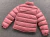 Jaqueta Puffer NOCTA Rosa na internet