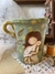 Caneca Mila.