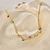 Colar cristais coloridos e plaquinhas lisas folheado a ouro 18k - comprar online