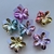 Pack broche flor hawaiana tornasolada x6 - comprar online