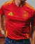 Camisa Espanha I 24/25 - Torcedor Masculino Adidas - Vermelha com detalhes em amarelo - comprar online