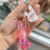 Box 24 Lip Gloss Buni Mágico Rosa com Chaveiro Vivai na internet
