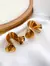 Brinco Espiral G em Ouro 18K - comprar online