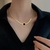 Colar lâmina numeral romano em Ouro 18K