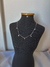Choker com pingentes na internet