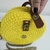 Bolsa redonda amarelo na internet