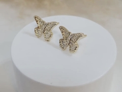 BRINCO BORBOLETA FOLHEADO EM OURO 18k.