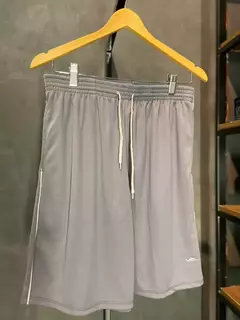 SHORT LONGO COM BOLSO ELITE