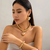 Imagem do Conjunto de SemiJoias Pulseira, Brinco e Colar com Pingente em forma de Coração Punk Love para Mulheres Elegantes e Estilosas