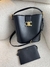 Bolsa Celine Bucket Louise - média preto com dourado - comprar online