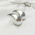 Brinco Virgula/Gota GG - loja online