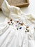 Vestido bordado de flores na internet
