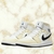 Air Jordan 1 Mid "Coconut Milk" na internet