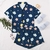 Pijama Curto Feminino Americano Ceu Estrelado com Blusa Gola Aberta de Botões e Short com Elástico