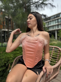 Corset con plumas