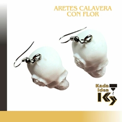 Aretes calavera con flor en internet