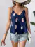 Top de tirantes con estampado de pluma