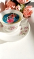 velas en taza de té
