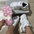New Balance 9060 - Branco/rosa