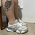 New Balance 9060 - Cinza e Bege na internet