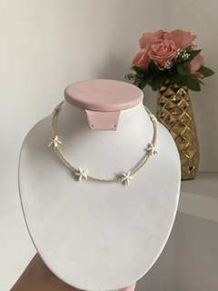 Choker estrella en fósil dorado