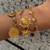 Brazalete con Charms de Astros "Amuleto Solar"