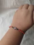 Pulsera ojo turco rojo. De 20 a 22 cm. Regulable.